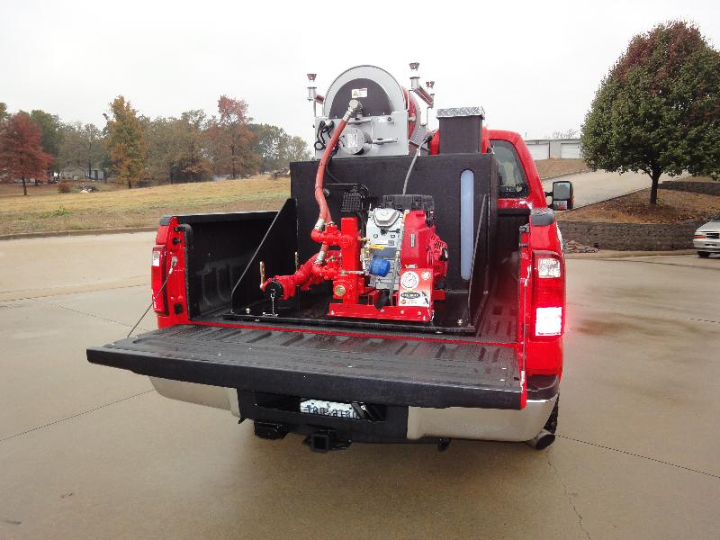 Naples, Texas, 2nd Skid Unit in Pickup, Rear View, Tailgate Down