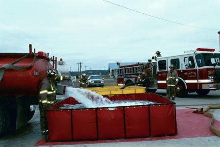 Tanker Dumping Into a Folding Tank